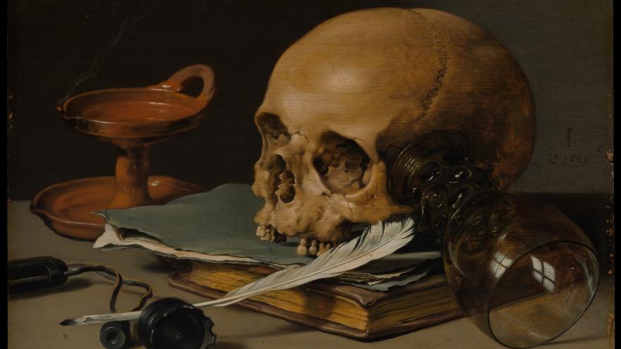 Still life with skull, book, and quill